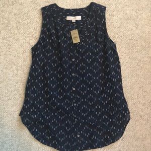 Sleeveless button down blouse